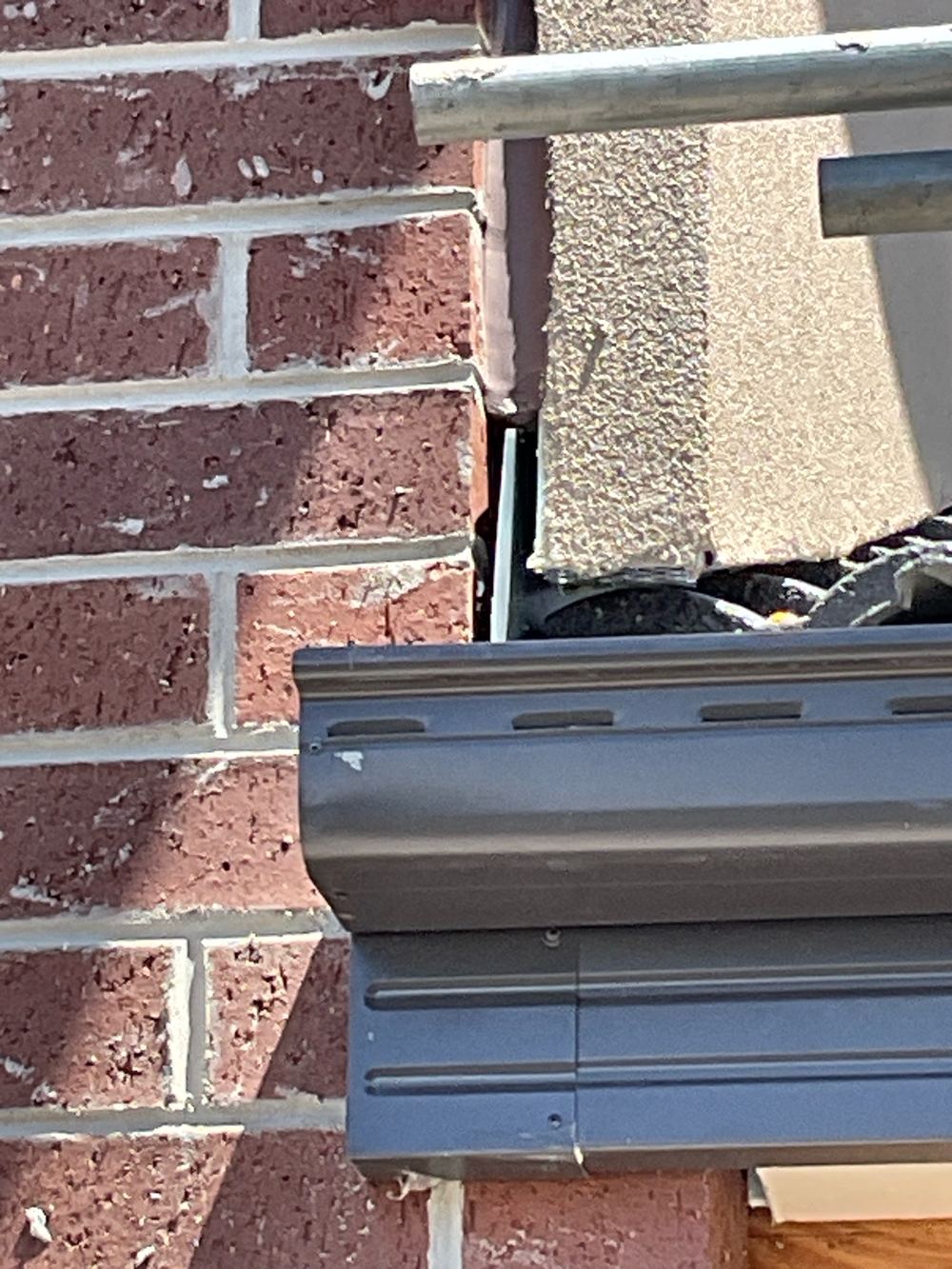 Roof penetration flashing poorly fitted and needing rework to keep water out, found during a fixing inspection in Kalkallo