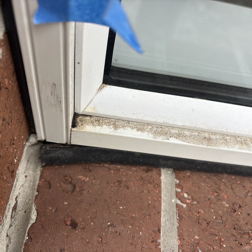 Window frame dented and scratched, needing repair or replacement, found during a pre-handover inspection in Kalkallo
