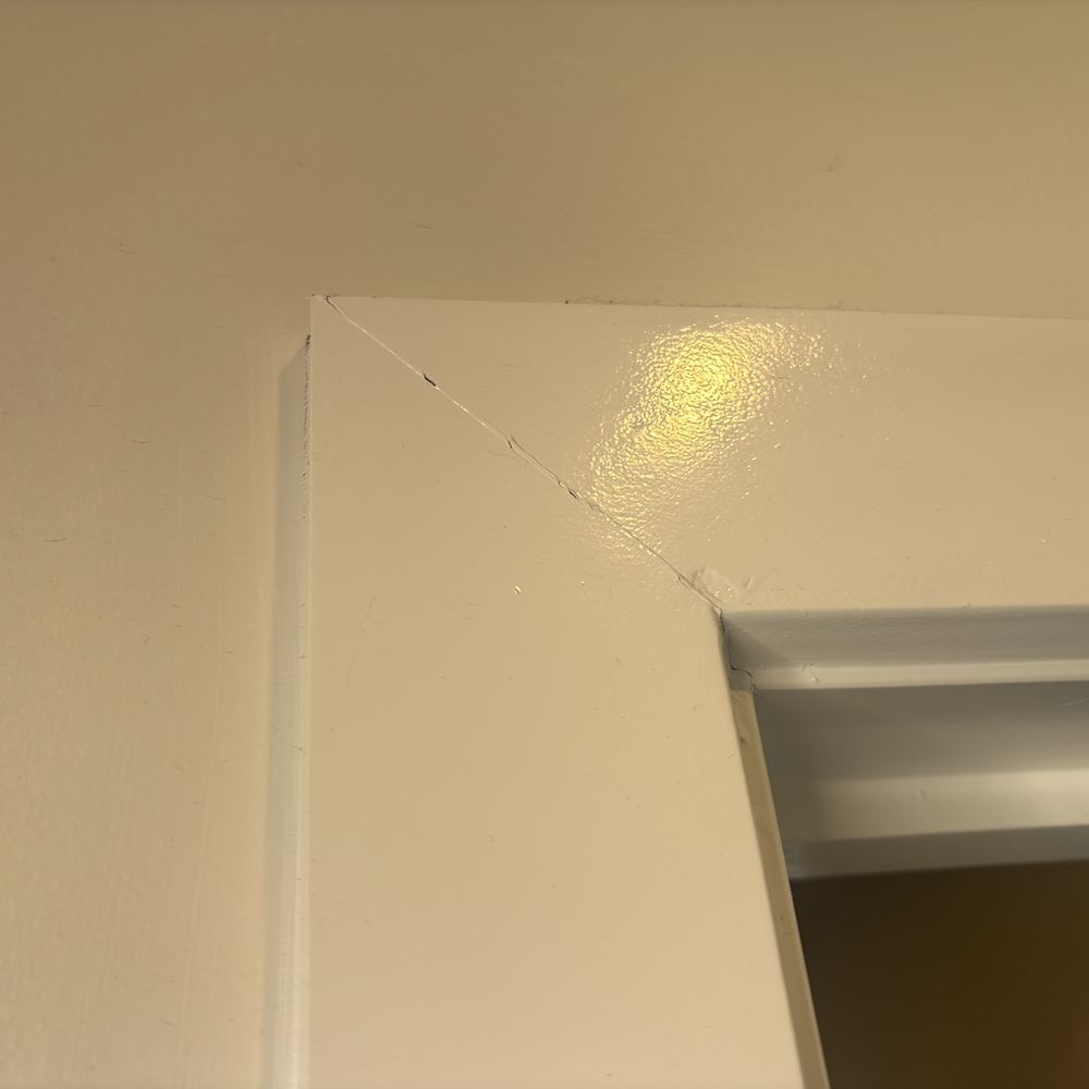Fine cracks at a door corner, consistent with long term settling, found during a pre-purchase inspection in Kalkallo