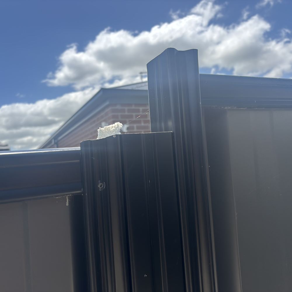 Side gate missing its hardware, so it cannot be opened from outside, found during a pre-purchase inspection in Kalkallo